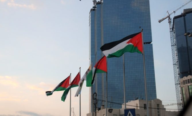 Amman Jordan- Locals in Amman, Jordan flags