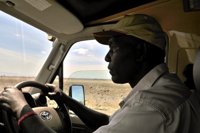 African Safari Injury - our driver and landrover