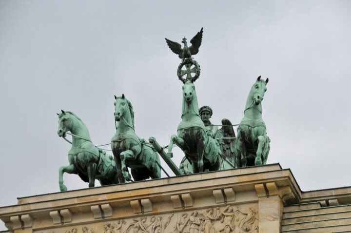 Berlin Germany=Olympic stadium and Checkpoint Charlie.