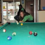 KC playing pool