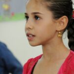 Syrian children learn yoga