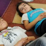 Syrian children learn yoga