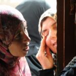 at the door, children, people, Amman, Jordan, women,