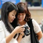 Women taking photos